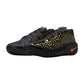 Scarpe da basket Nike GT Cut 4 "Gold Panther" di Victor Wembanyama, design elegante con dettagli dorati e suola in gomma.