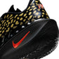 Scarpe da basket Nike GT Cut 4 "Gold Panther" di Victor Wembanyama PE, design con dettagli dorati e suola in gomma.