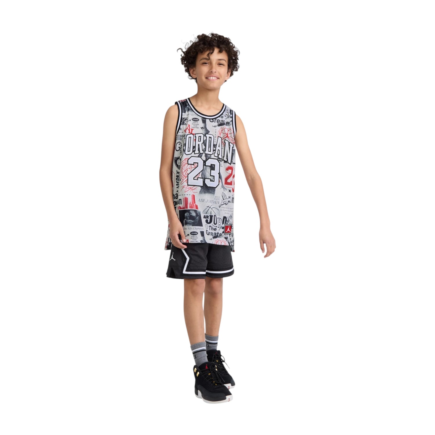Canotta Jordan Kids AOP Jersey, maglietta senza maniche con stampa a motivi, tessuto traspirante e logo Jordan visibile.