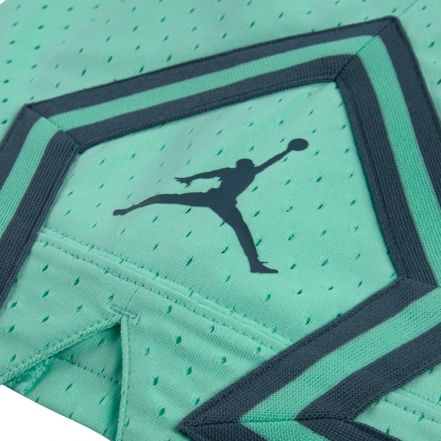 Pantaloncini da basket Jordan Diamond Kids teal, pantaloncino sportivo per bambini, con logo Jordan visibile.