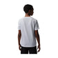 Maglietta Jordan Brooklyn Varsity Tee da bambino, t-shirt in cotone con logo Jordan e dettagli sportivi, colore nero.