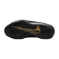 Scarpe da basket Nike GT Cut 4 "Gold Panther" di Victor Wembanyama PE, dettagli in oro e design sportivo.