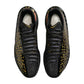 Scarpe da basket Nike GT Cut 4 "Gold Panther" di Victor Wembanyama, design con dettagli dorati e suola bianca.