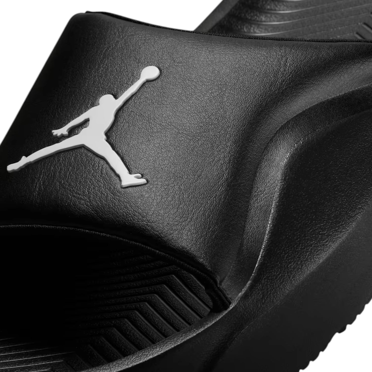 Ciabatte Jordan Franchise Slides per uomo, nere e bianche, con design sportivo e logo Jordan visibile.