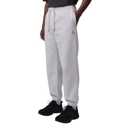 Pantaloni Jordan Brooklyn Fleece Cuffed grigio melange IM8906-054 – vista frontale logo Jumpman bronzo Archaeo Brown