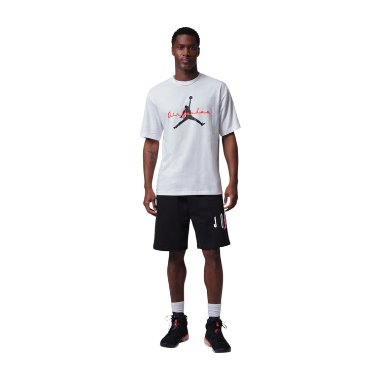 T-shirt Nike Air Jordan Brooklyn Uomo, bianco con dettagli neri e rossi, logo Jumpman sul fronte.