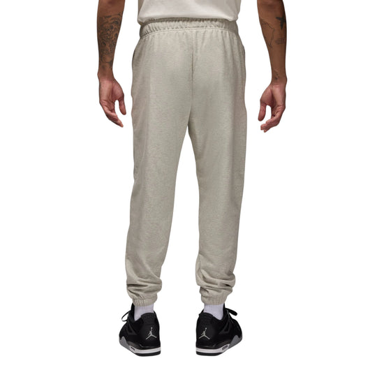 Pantaloni sportivi Air Jordan Brooklyn Crossover in tessuto grigio, stile athleisure per uomo.