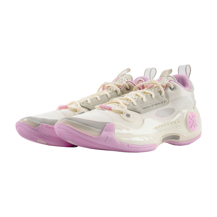 Scarpe da basket Li-Ning Way of Wade 10 Low Storm Surge in rosa e bianco, con design sportivo e dettagli in panna.