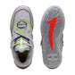 Scarpe da basket Puma MB.05 Shine JR per bambini, con design grigio, arancione e giallo, ispirate a Lamelo Ball, stile NBA.