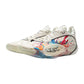 Scarpe da basket Li-Ning Wade All City 13 Fireworks in bianco, rosso, blu e giallo, con design dinamico e dettagli colorati.