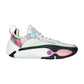 Scarpe da basket Li Ning Wade All City 14 Surreal bianche, rosa, nere e azzurre, con design dinamico e dettagli colorati.