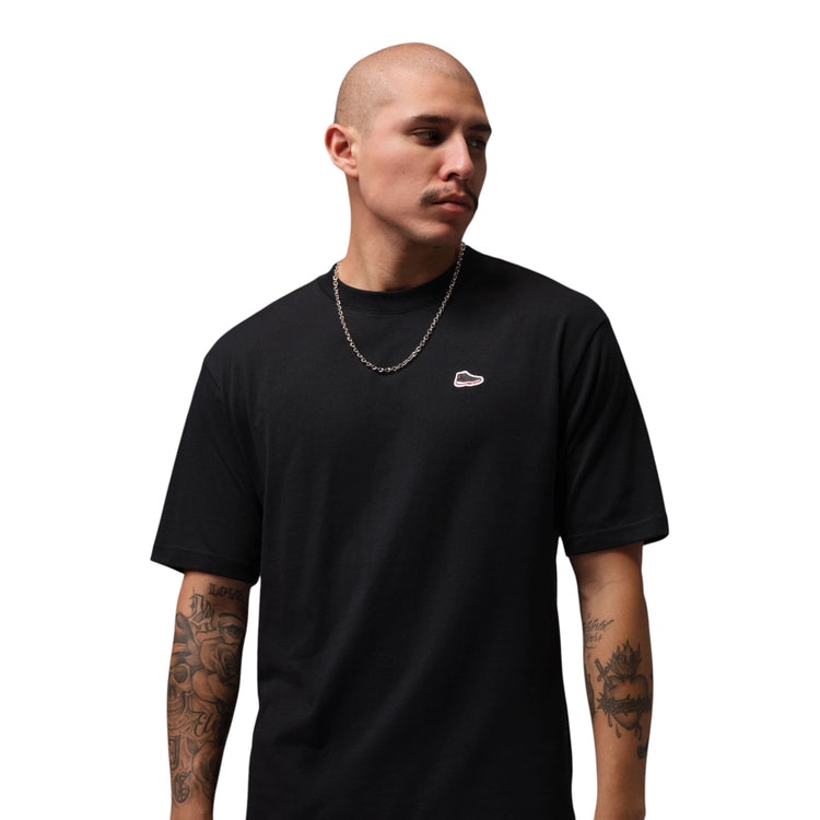 T-shirt Jordan Brand AJ11 Uomo nera IM6513-011 – vista frontale grafica Air Jordan 11 sul petto Gym Red