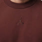 Felpa marrone girocollo Jordan Brooklyn – dettaglio del logo Jumpman Air ricamato sul petto
